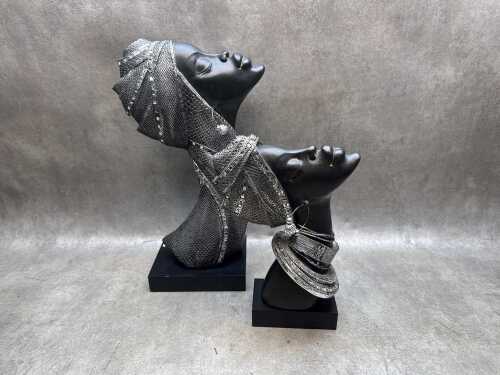 Two African tribal women with ornamental faces