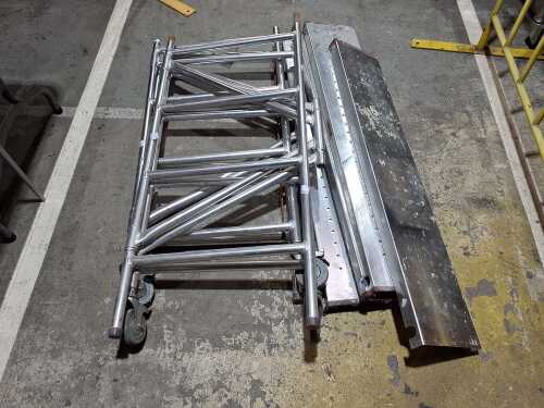 A mobile scaffold ladder