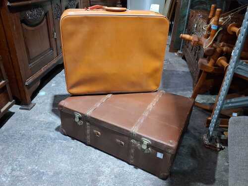Two vintage suitcases in brown