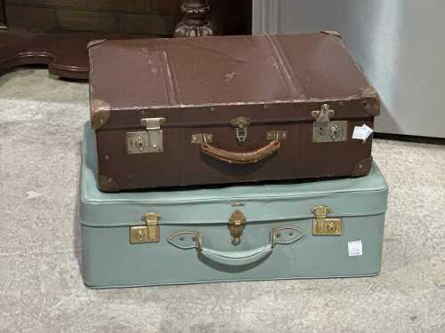 Two vintage suitcases in brown and sage green