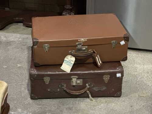 Two vintage suitcases in brown