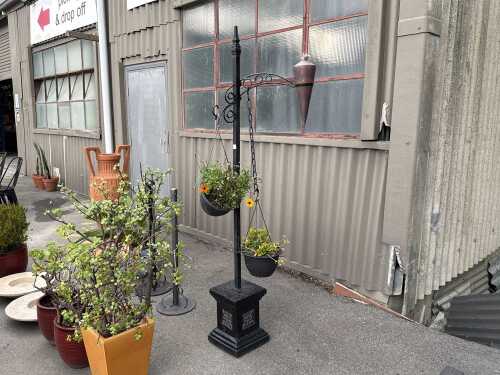 Cast iron wall flower hanging basket frame