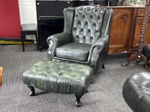 Green leather wingback Chesterfield chair with matching ottoman