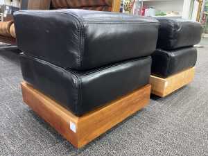 Pair of leather ottomans with timber plinth bases - 2
