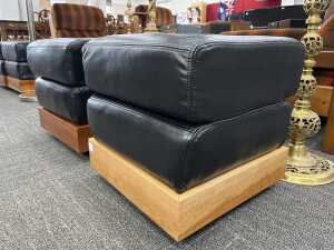 Pair of leather ottomans with timber plinth bases - 3