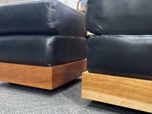 Pair of leather ottomans with timber plinth bases - 4