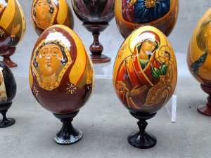 Nine Russian Orthodox hand-painted timber Easter eggs with stands. - 4