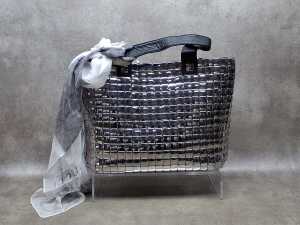 Designer-style silver tone handbag with floral lining