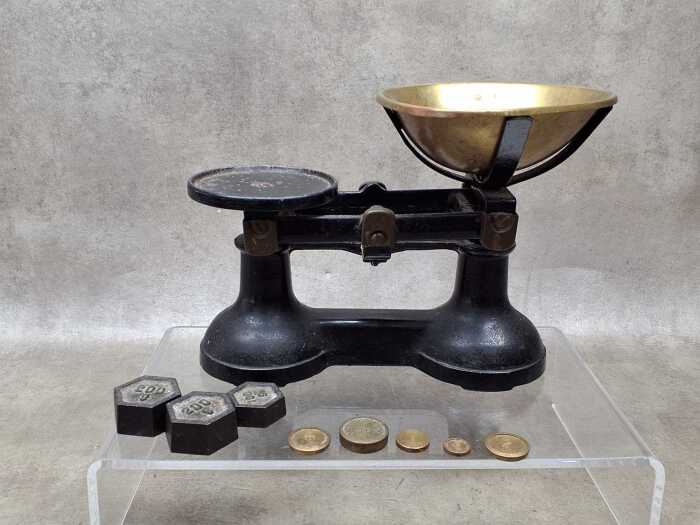 Antique cast iron and brass balance scales.