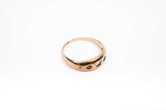 An antique empty ring setting in 15 carat yellow gold