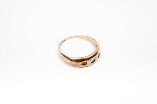An antique empty ring setting in 15 carat yellow gold