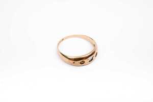 An antique empty ring setting in 15 carat yellow gold
