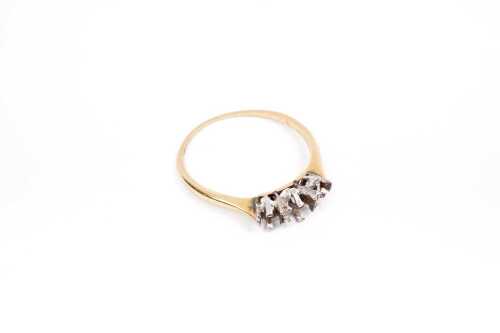 An empty ring setting in 18 carat and platinum