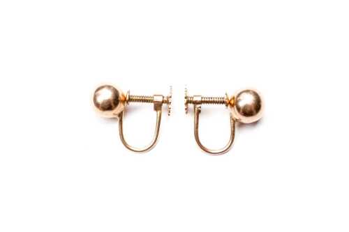 A pair of vintage screw back ball earrings in 9 carat yellow gold