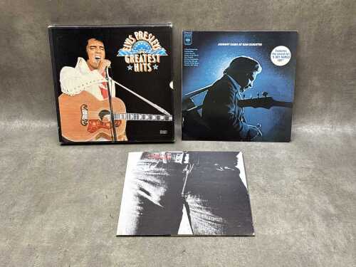 Three vinyl records