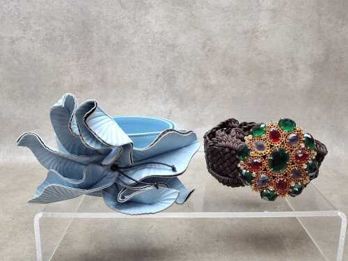 Two designer-style belts
