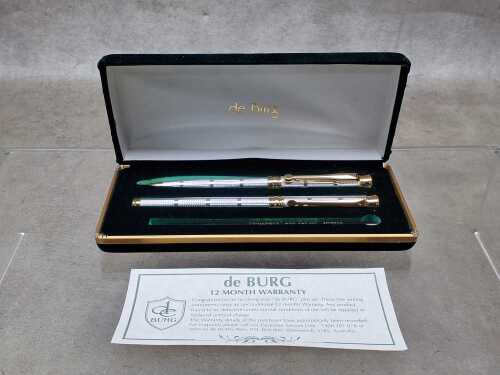 Pair of de Burg pens in a display box.