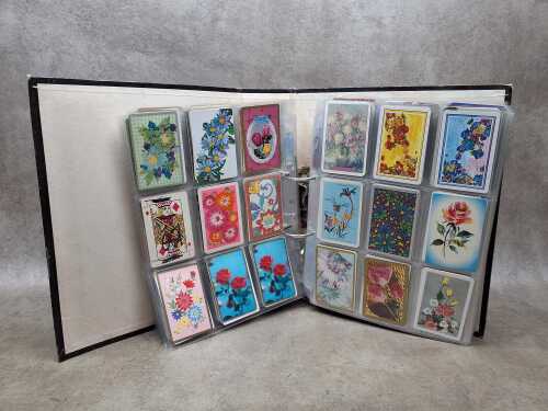 Album of vintage swap cards and playing cards