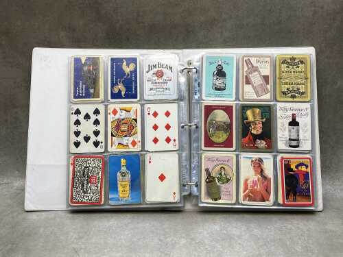Album of vintage swap cards and playing cards