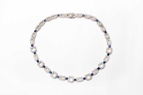 A blue and white cubic zirconia necklace in sterling silver