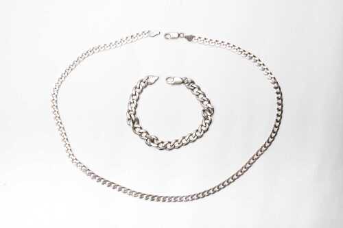 A curb link necklace and bracelet in sterling silver