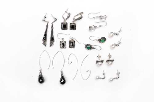 A collection of earrings in sterling silver
