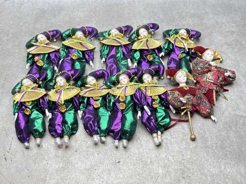 Vintage porcelain jester and harlequin dolls.