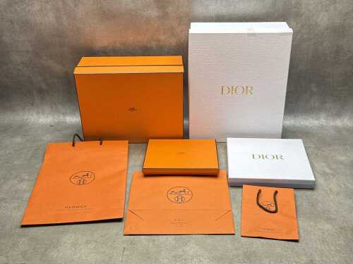 Designer-style packaging in orange, brown and white