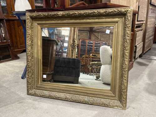 Antique wall mirror with gilded oak leaf design frame