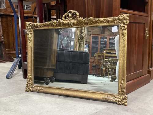 Ornate timber wall mirror with scroll and floral detail