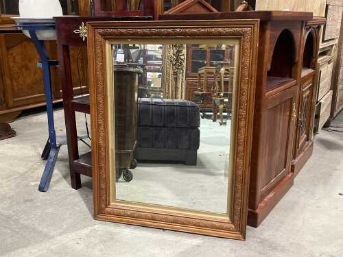 Vintage carved timber framed mirror with bevelled edges