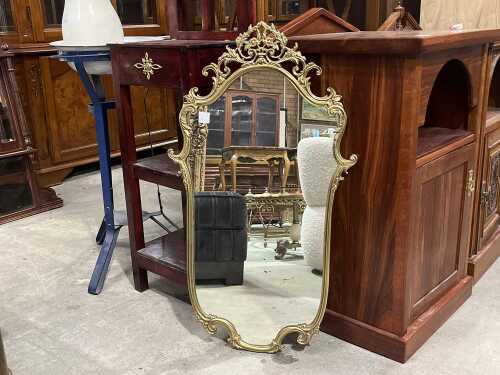 Ornate gold-tone mirror