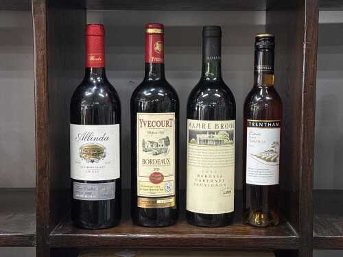 Four bottles of alcohol tbs