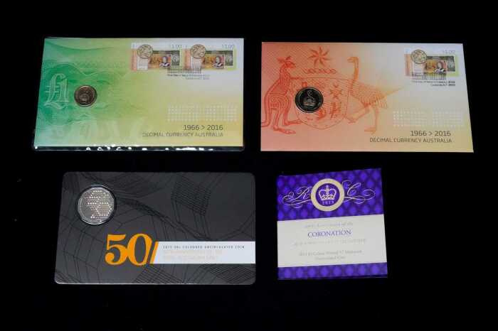 Four uncirculated Australian coins