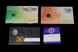 Four uncirculated Australian coins