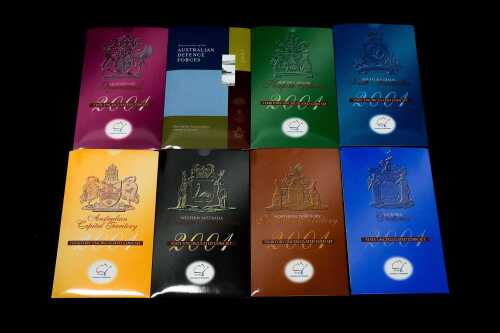 Eight Australian 2001 uncirculated coin sets