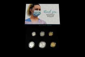 Four Australian proof year and uncirculated coin sets - 2