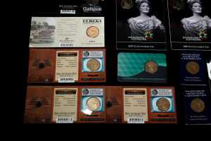 Group of uncirculated $1 and $2 coins - 4