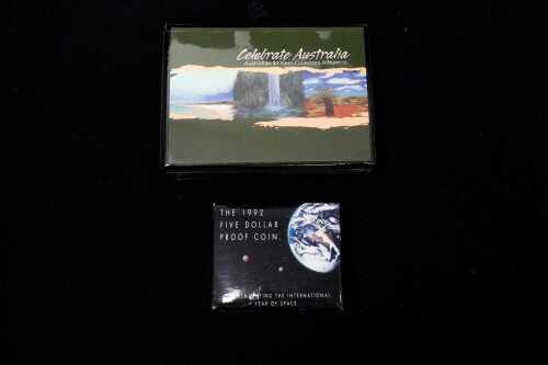 Celebrate Australia $1 coin collectors album plus a 1992 $5 proof coin