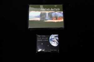 Celebrate Australia $1 coin collectors album plus a 1992 $5 proof coin