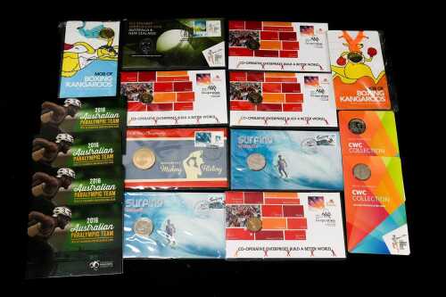 A group of Sport-themed collectable coins