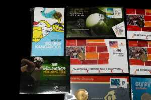 A group of Sport-themed collectable coins - 2