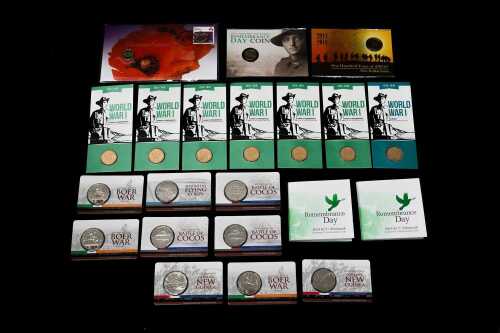 Group of Remembrance and war themed proof coins