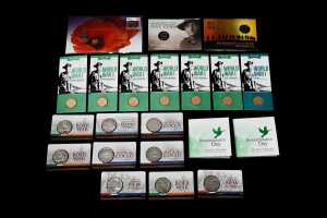 Group of Remembrance and war themed proof coins