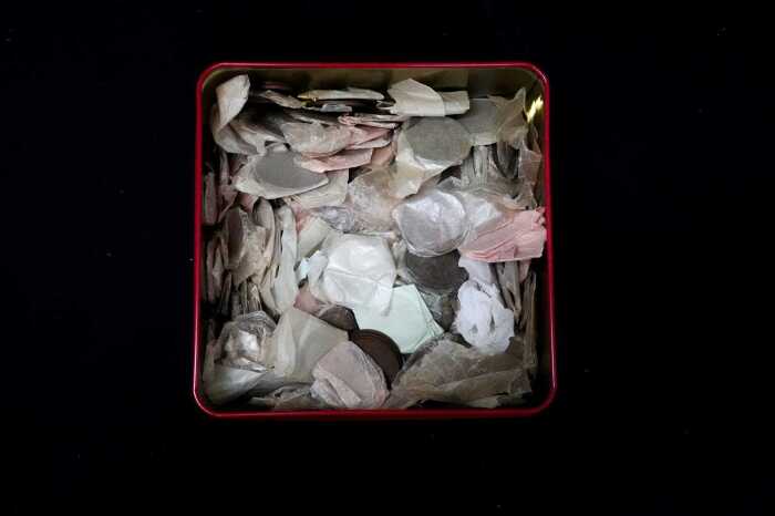 A tin of assorted Australian pennies and halfpennies