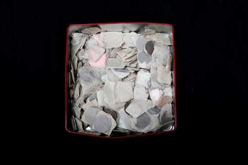 A tin of assorted Australian pennies and halfpennies