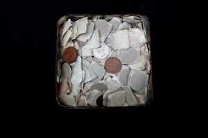 A tin of assorted Australian pennies and halfpennies