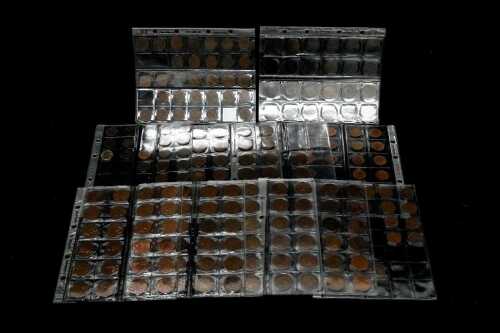 A group of assorted pennies and half pennies