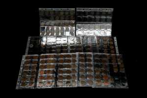 A group of assorted pennies and half pennies