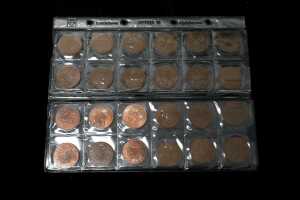 A group of assorted pennies and half pennies - 2